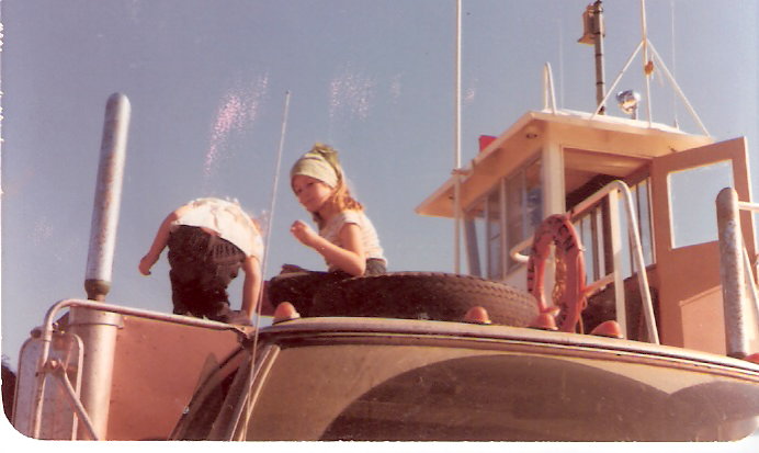 Michelle and Janine, on the Peel River Ferry crossing, travelling to Inuvik.