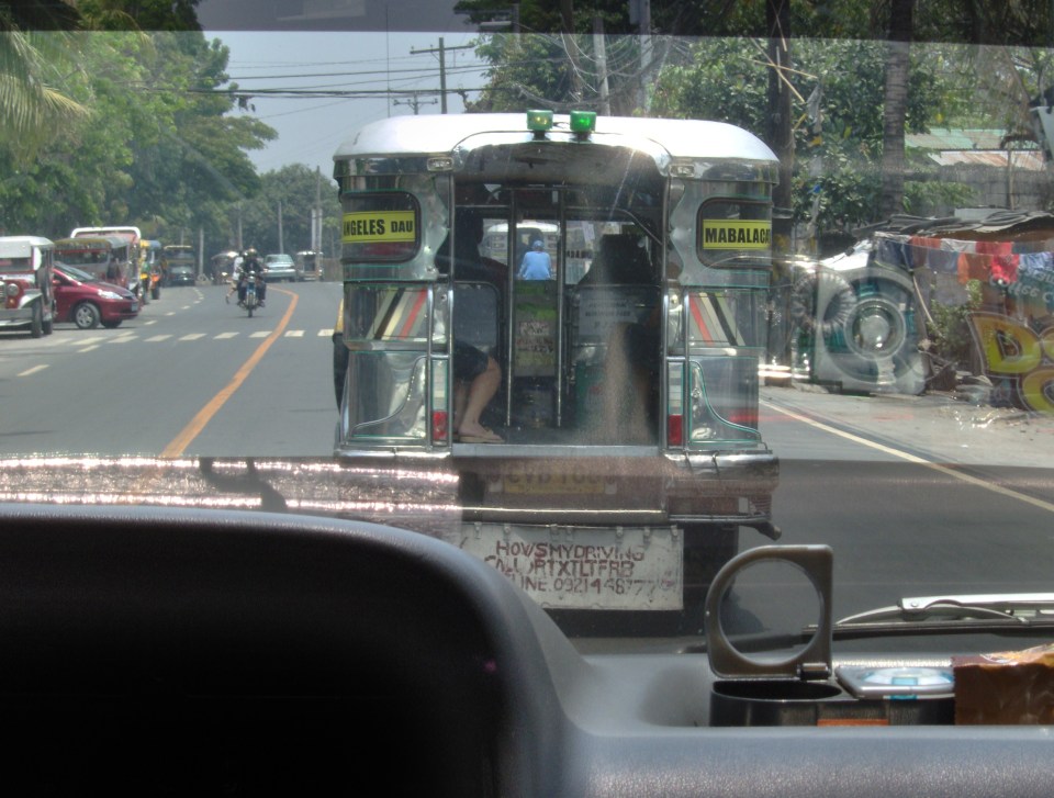 Jeepneys are a popular mode of travel, ( modified US military jeeps from yesteryears) 