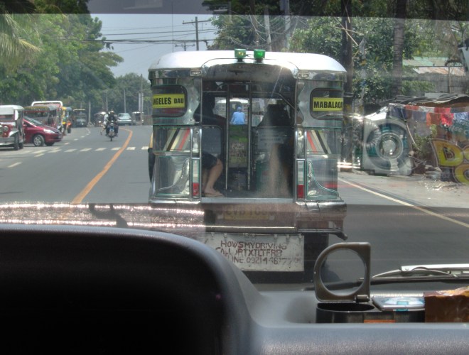 Jeepneys are a popular mode of travel, ( modified US military jeeps from yesteryears) 